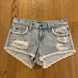 Denim shorts with white crochet detail